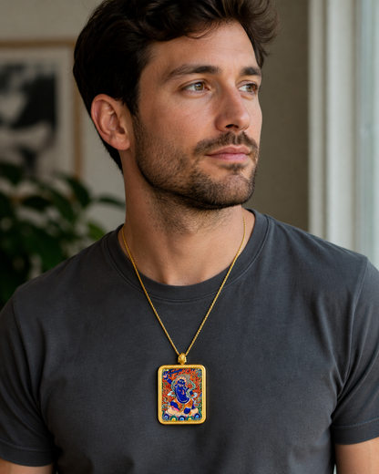 Man wearing an AURESTAR Buddhist thangka pendant in a home setting.