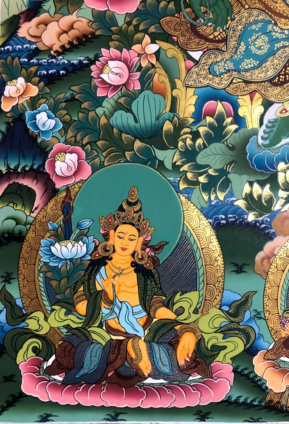 Lower-left Buddhist figure detail from the AURESTAR Green Tara thangka.