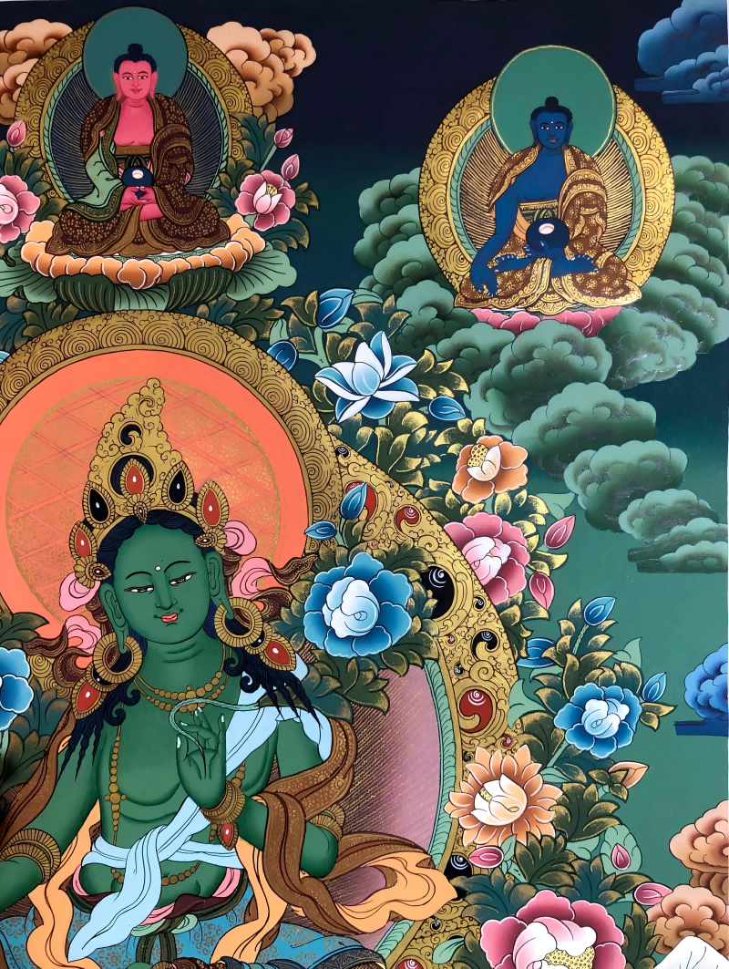 Upper-right detail of Green Tara thangka with blue Buddhist figure.