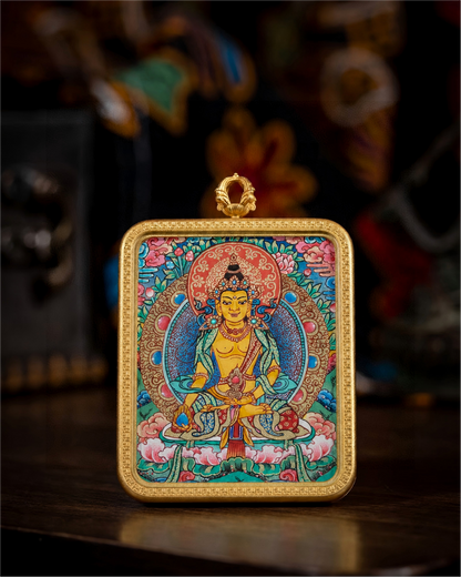 AURESTAR Ksitigarbha thangka pendant displayed upright on a wooden table.