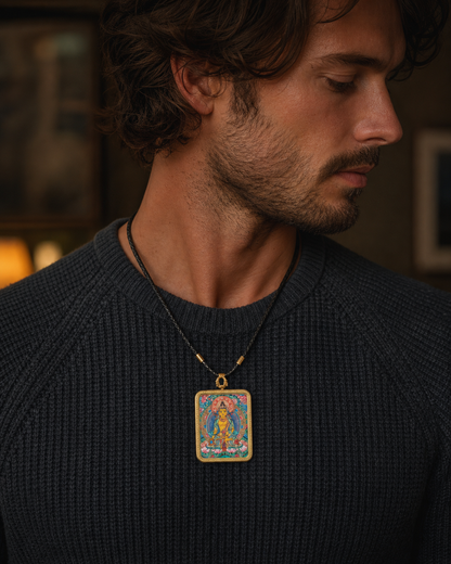 Man wearing an AURESTAR Ksitigarbha thangka pendant with a dark sweater.