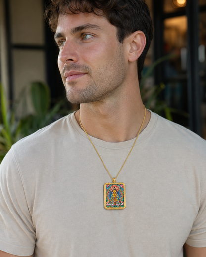 Man wearing an AURESTAR Ksitigarbha thangka pendant with a gray shirt.