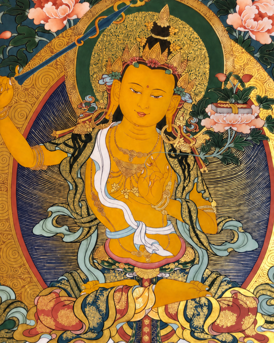 Close-up of the central Manjushri Bodhisattva figure in an AURESTAR thangka.