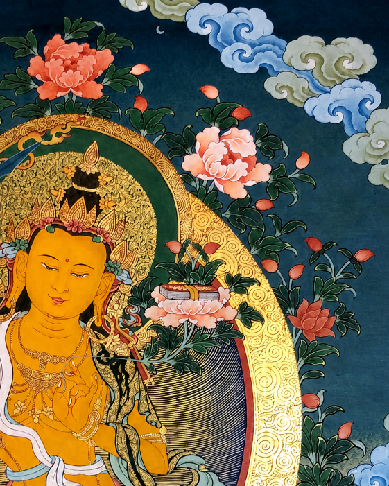 AURESTAR Manjushri thangka detail with flowers, clouds, and scripture on lotus.