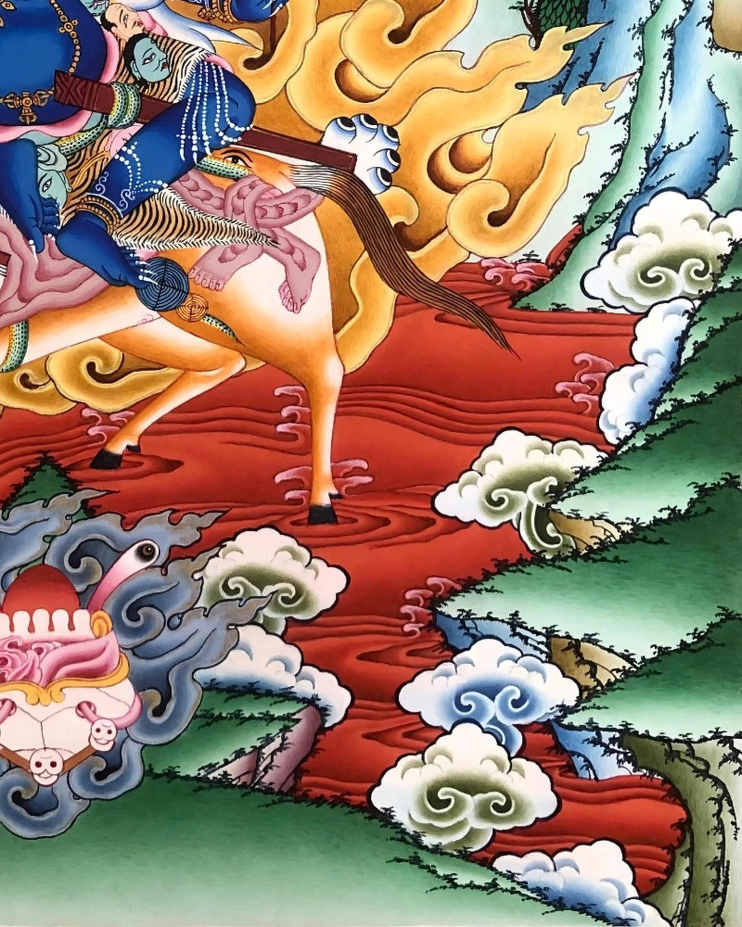 Lower-right thangka detail with red ground, clouds, and green hills.