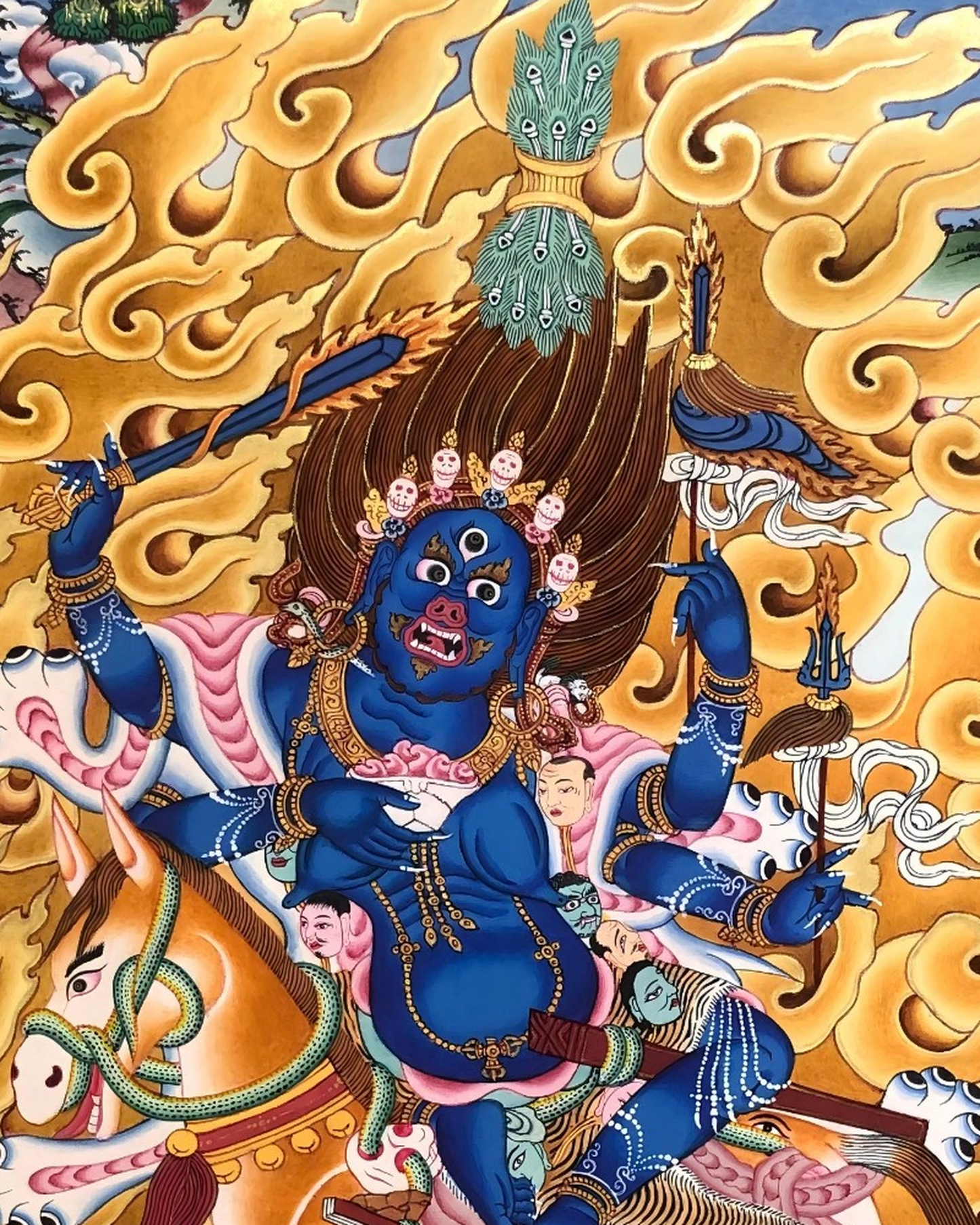 Close-up of the blue Buddhist protector figure in the Palden Lhamo thangka.