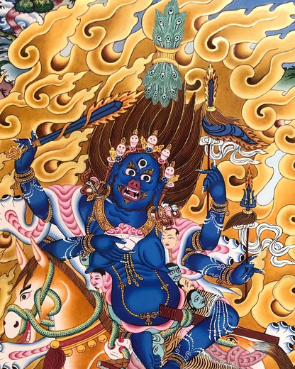 Close-up of the blue Buddhist protector figure in the Palden Lhamo thangka.