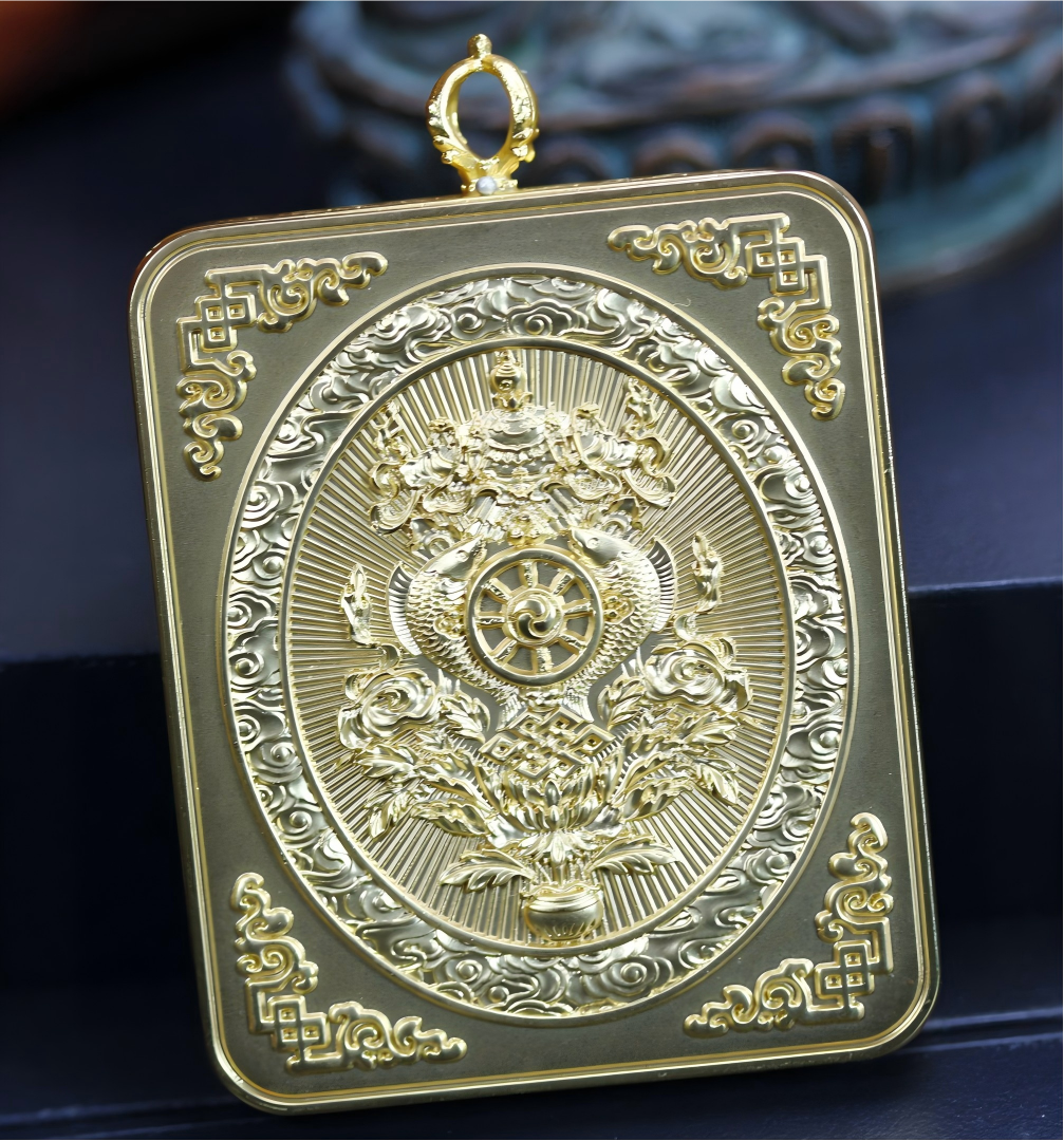 Back view of the AURESTAR pendant with raised Buddhist motifs.